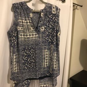 Asymmetric sleeveless top